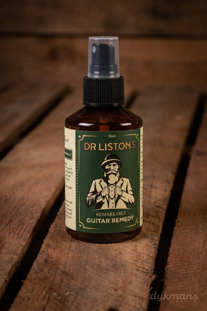 Dr. Liston's Remarkable Guitar Remedy 150 ml op een warme houten achtergrond