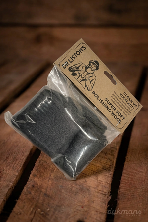 Dr. Liston's Super Soft Polishing Wool 2 m op een warme houten achtergrond